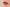 Close-up de lábios com lip balm hidratante, destacando sua textura e brilho.